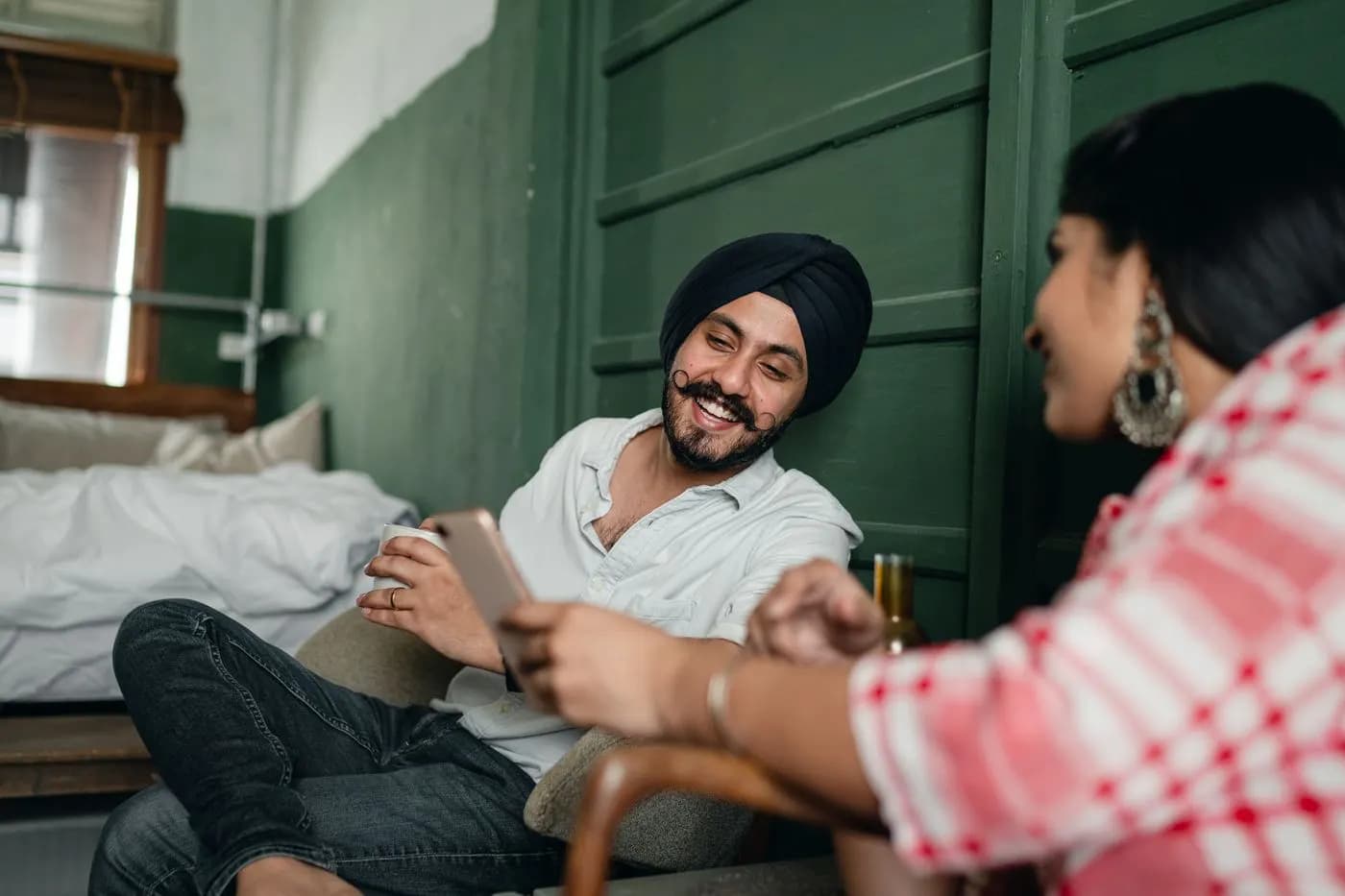 Couple sharing a moment with smartphones